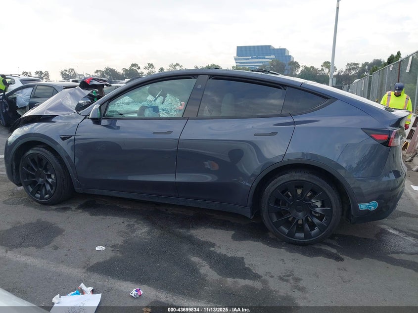 2023 Tesla Model Y Awd/Long Range Dual Motor All-Wheel Drive VIN: 7SAYGDEE9PF937549 Lot: 43699834