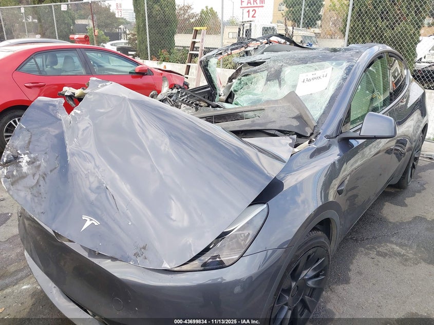 2023 Tesla Model Y Awd/Long Range Dual Motor All-Wheel Drive VIN: 7SAYGDEE9PF937549 Lot: 43699834