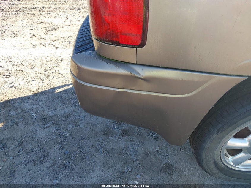 2002 GMC Envoy Slt VIN: 1GKDT13SX22355183 Lot: 43700260