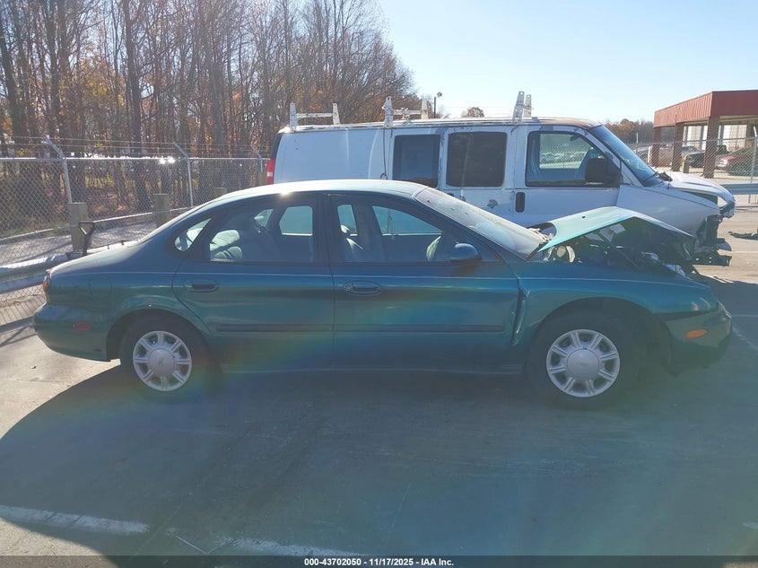 1997 Ford Taurus Gl VIN: 1FALP52U6VA305600 Lot: 43702050