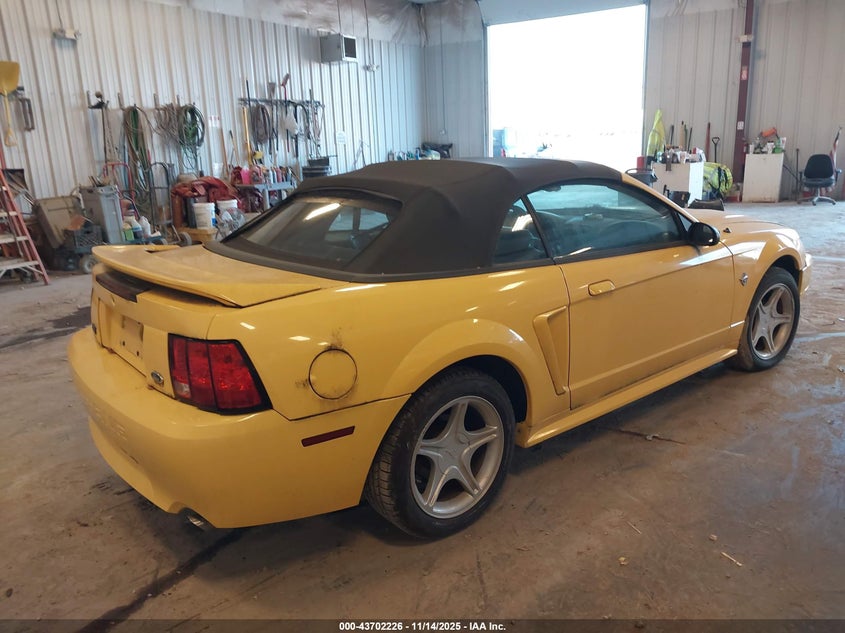1FAFP45X5XF212294 1999 FORD MUSTANG photo no. 4