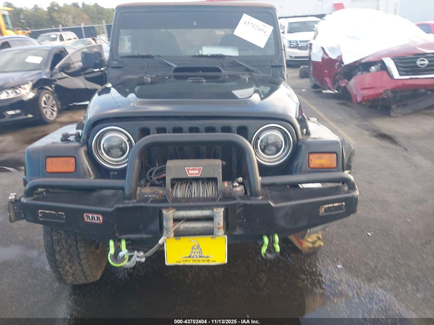 1999 Jeep Wrangler Sahara VIN: 1J4FY49S7XP430408 Lot: 43702404