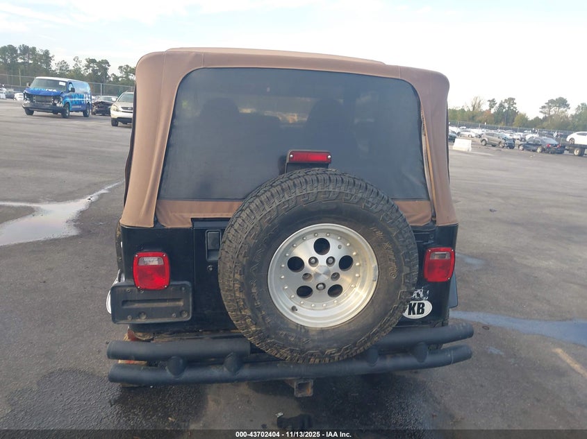1999 Jeep Wrangler Sahara VIN: 1J4FY49S7XP430408 Lot: 43702404