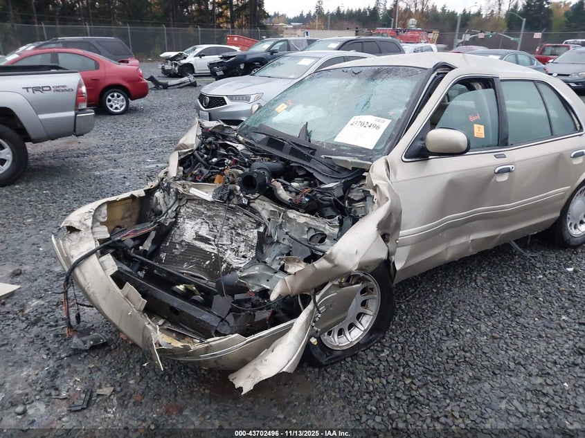 2000 Ford Crown Victoria Lx VIN: 2FAFP74W9YX100422 Lot: 43702496