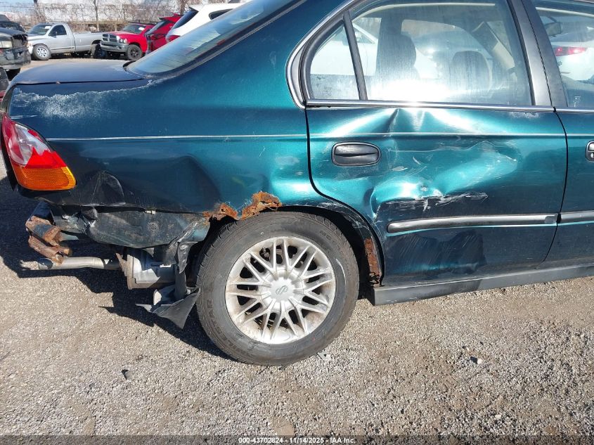 1997 Honda Civic Lx VIN: 2HGEJ6679VH586034 Lot: 43702824