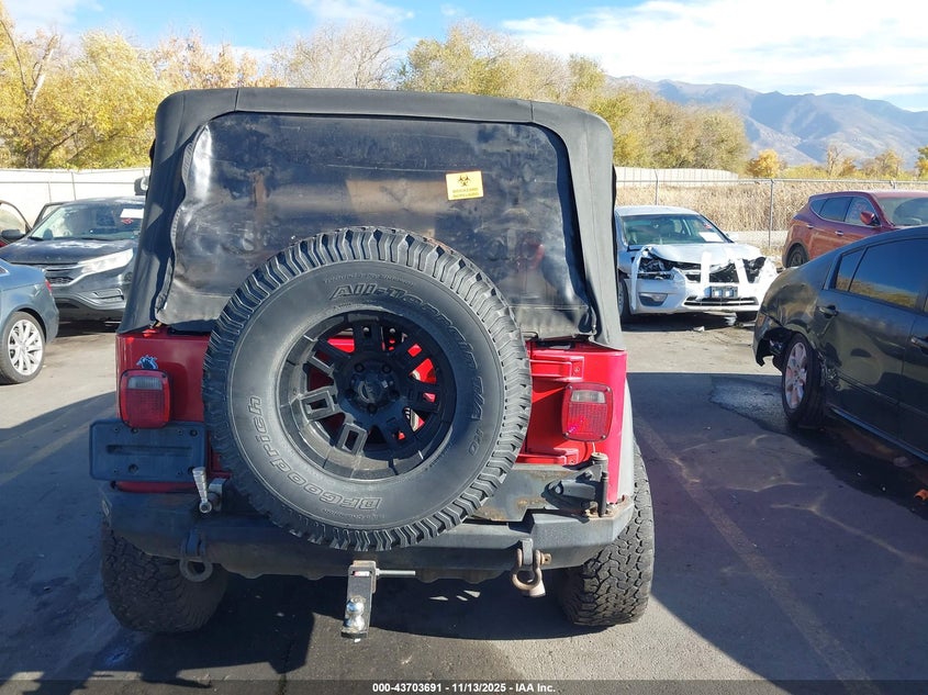 2003 Jeep Wrangler X VIN: 1J4FA39SX3P314886 Lot: 43703691