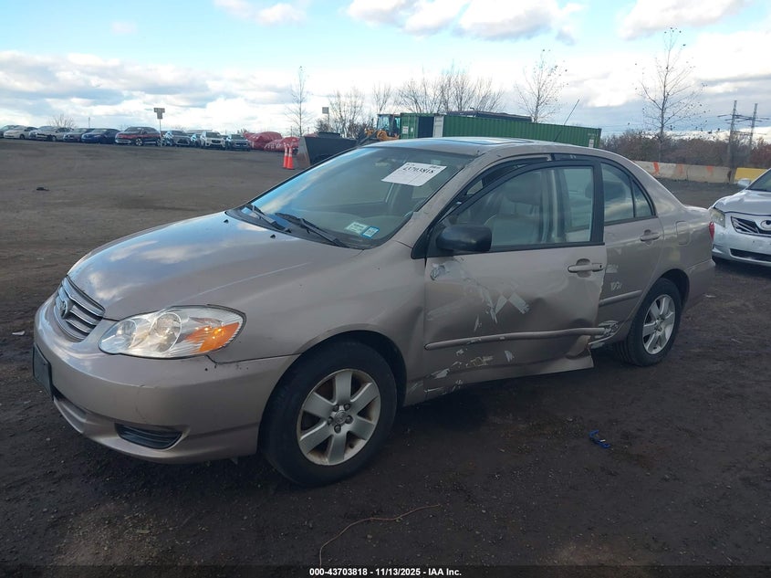 2T1BR38E03C032604 2003 TOYOTA COROLLA photo no. 6