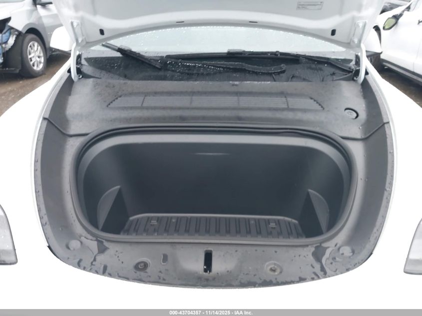 2025 Tesla Model Y Long Range Dual Motor All-Wheel Drive VIN: 7SAYGAEE5SF306207 Lot: 43704357