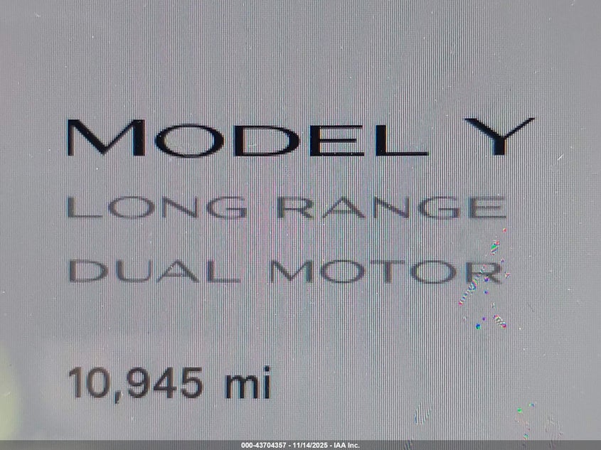 2025 Tesla Model Y Long Range Dual Motor All-Wheel Drive VIN: 7SAYGAEE5SF306207 Lot: 43704357
