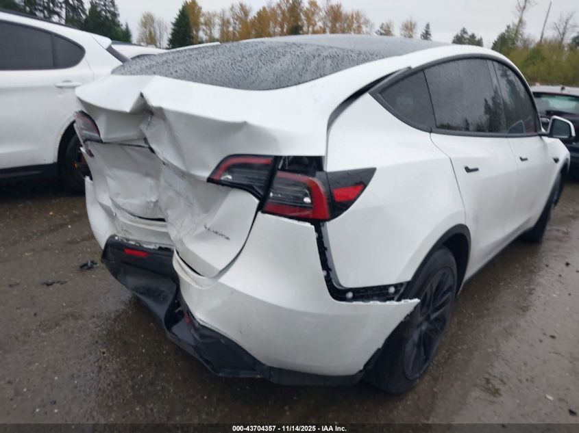 2025 Tesla Model Y Long Range Dual Motor All-Wheel Drive VIN: 7SAYGAEE5SF306207 Lot: 43704357