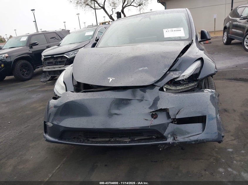 2023 Tesla Model Y Performance Dual Motor All-Wheel Drive VIN: 7SAYGDEF2PF941631 Lot: 43704800