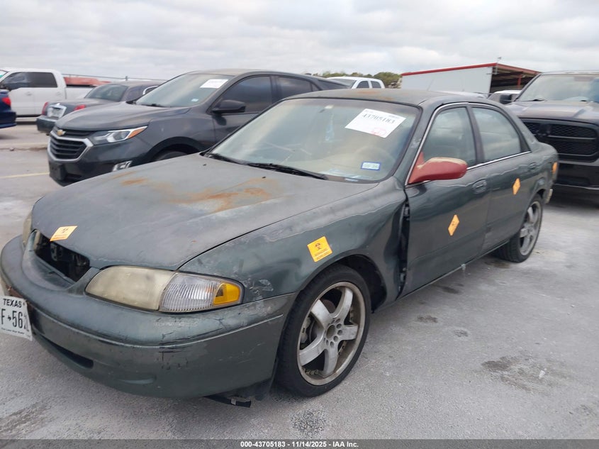 1998 Mazda 626 Dx/Lx VIN: 1YVGF22C3W5772322 Lot: 43705183