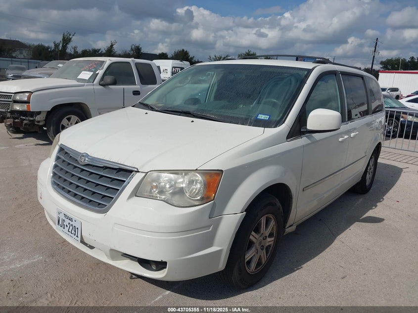 Vin: 2a4rr5d10ar414040, lot: 44200687, chrysler town & country touring 20102