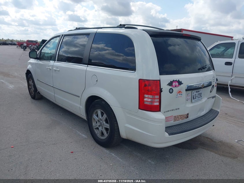Vin: 2a4rr5d10ar414040, lot: 44200687, chrysler town & country touring 20103