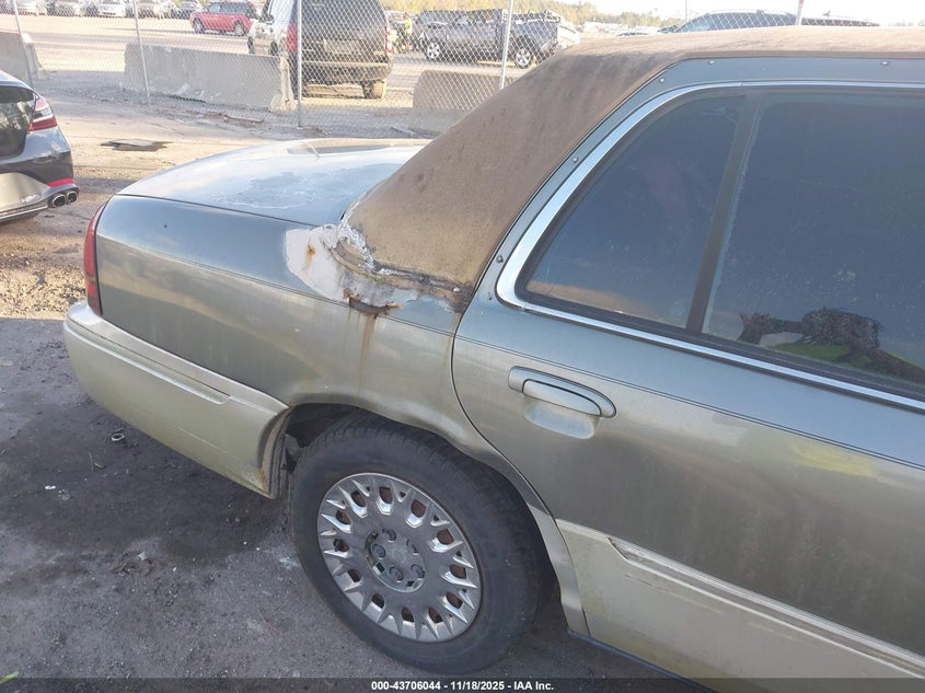 2004 Mercury Grand Marquis Gs VIN: 2MEFM74W34X664918 Lot: 43706044
