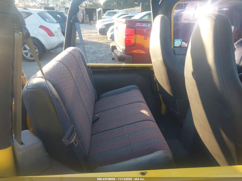 2000 Jeep Wrangler Sport VIN: 1J4FA49S5YP772607 Lot: 43706089