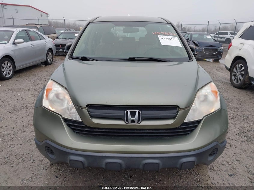 2009 Honda Cr-V Lx VIN: JHLRE48369C017768 Lot: 43706126
