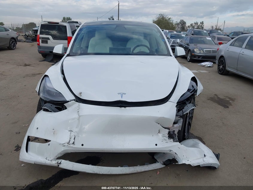 7SAYGDEF5NF390415 2022 TESLA MODEL Y photo no. 11