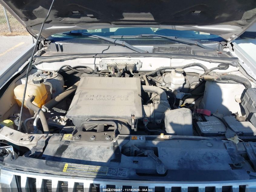 2009 Mercury Mariner V6 VIN: 4M2CU91G79KJ06118 Lot: 43708487