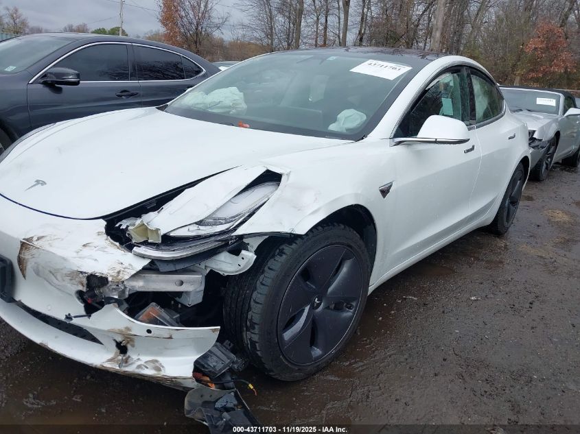 2018 Tesla Model 3 Long Range/Performance VIN: 5YJ3E1EBXJF151218 Lot: 43711703