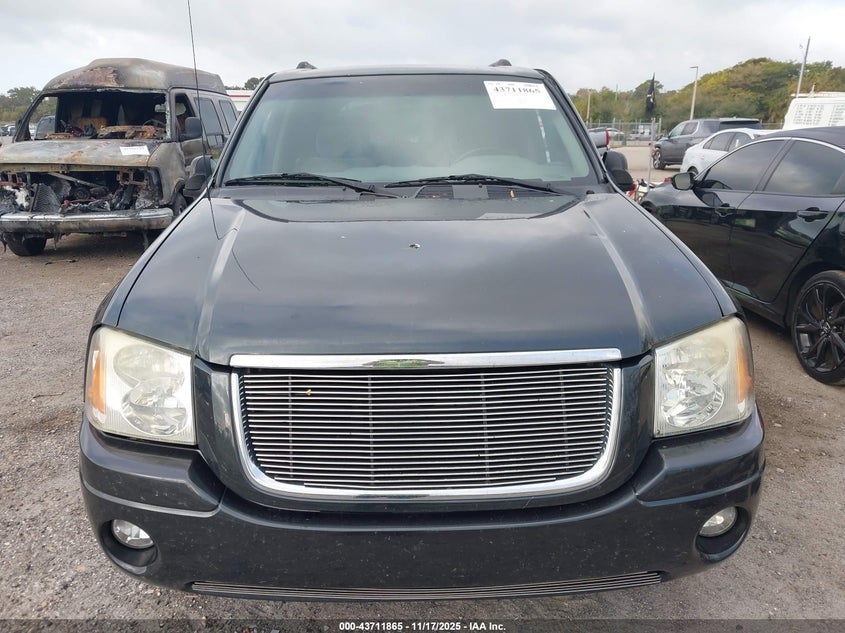 2004 GMC Envoy Sle VIN: 1GKDS13S542409267 Lot: 43711865