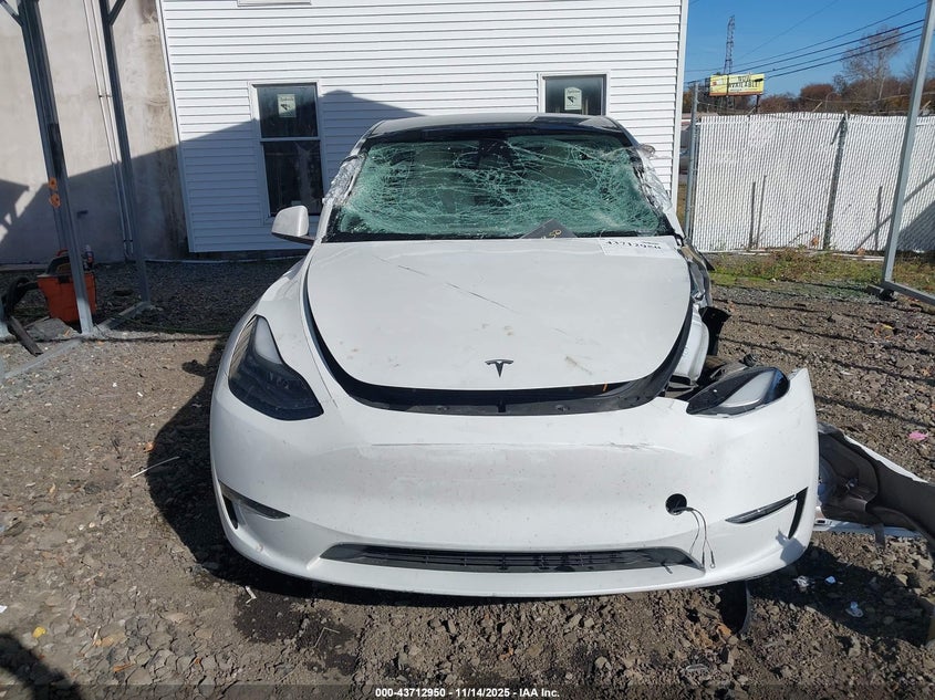 2023 Tesla Model Y Awd/Long Range Dual Motor All-Wheel Drive VIN: 7SAYGDEE7PF699670 Lot: 43712950