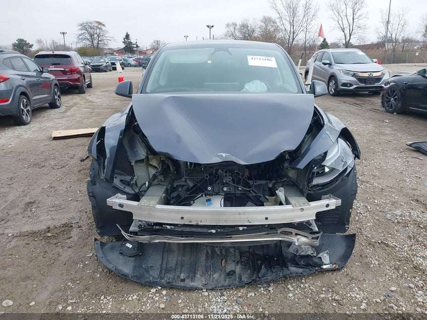 2023 Tesla Model Y Awd/Long Range Dual Motor All-Wheel Drive VIN: 7SAYGAEEXPF976827 Lot: 43713106