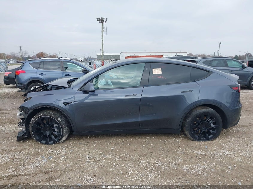 2023 Tesla Model Y Awd/Long Range Dual Motor All-Wheel Drive VIN: 7SAYGAEEXPF976827 Lot: 43713106
