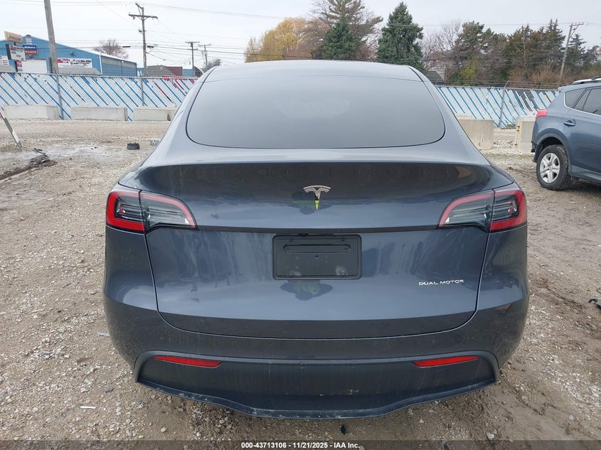 2023 Tesla Model Y Awd/Long Range Dual Motor All-Wheel Drive VIN: 7SAYGAEEXPF976827 Lot: 43713106