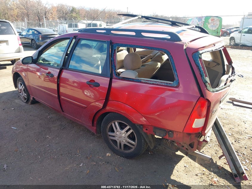 1FAHP36351W196734 2001 FORD FOCUS photo no. 3