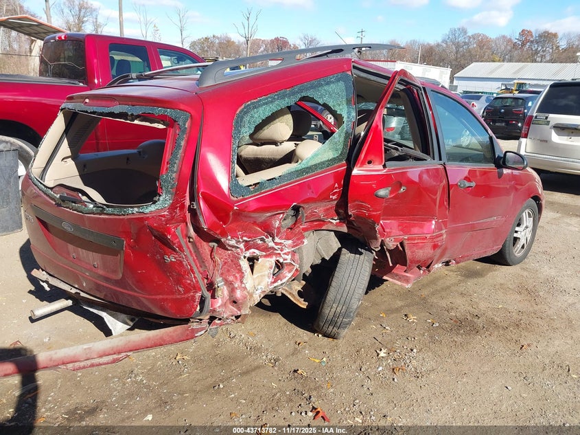 1FAHP36351W196734 2001 FORD FOCUS photo no. 4