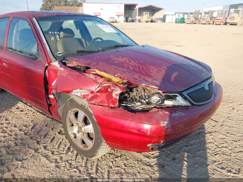 1999 Mercury Mystique Ls VIN: 1MEFM66L8XK608607 Lot: 43714271