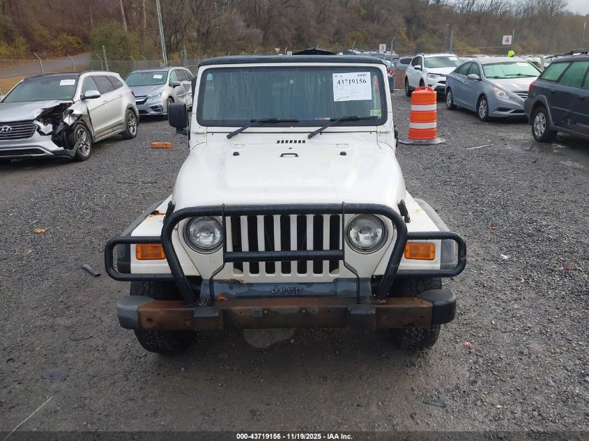 2004 Jeep Wrangler Sport Rhd VIN: 1J4F449S04P732923 Lot: 43719156