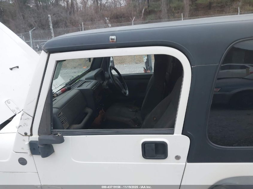 2004 Jeep Wrangler Sport Rhd VIN: 1J4F449S04P732923 Lot: 43719156