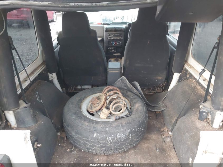 2004 Jeep Wrangler Sport Rhd VIN: 1J4F449S04P732923 Lot: 43719156