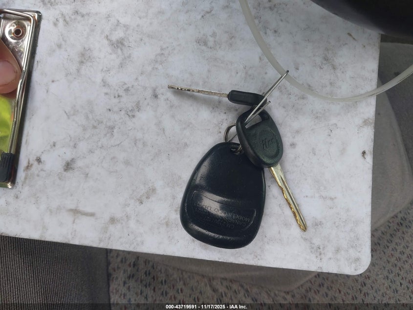 2003 Chevrolet Tahoe Ls VIN: 1GNEC13T23R195728 Lot: 43719591