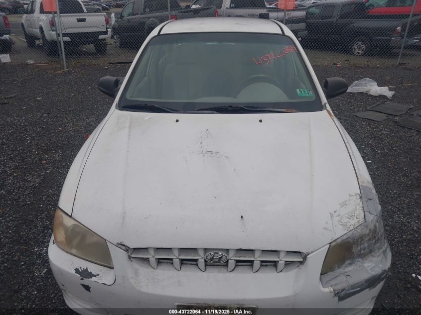 2000 Hyundai Accent Gl VIN: KMHCG45G8YU031907 Lot: 43722064