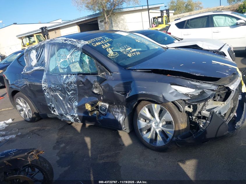 2023 Tesla Model Y Awd/Long Range Dual Motor All-Wheel Drive VIN: 7SAYGAEE6PF743446 Lot: 43722767