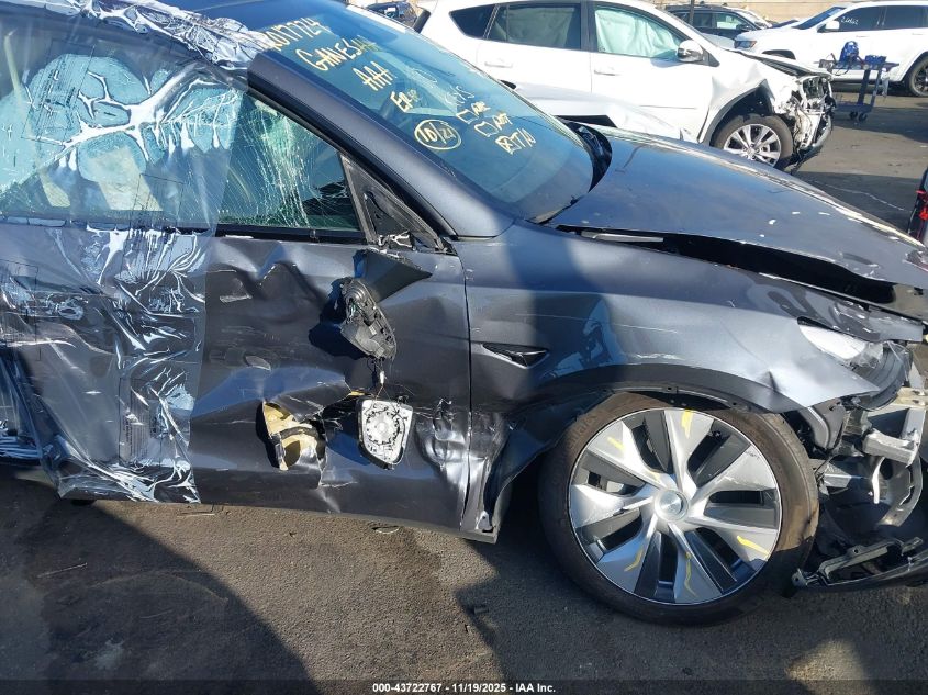 2023 Tesla Model Y Awd/Long Range Dual Motor All-Wheel Drive VIN: 7SAYGAEE6PF743446 Lot: 43722767