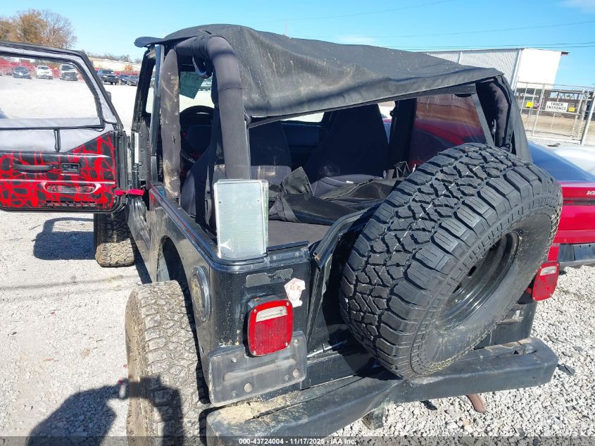 2000 Jeep Wrangler Sport VIN: 1J4FA49S5YP776043 Lot: 43724004