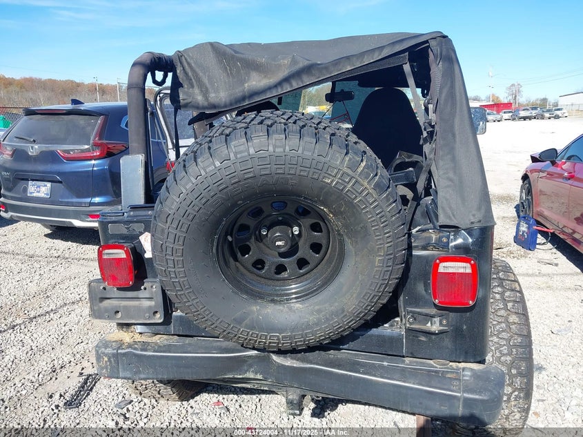 2000 Jeep Wrangler Sport VIN: 1J4FA49S5YP776043 Lot: 43724004