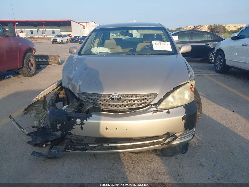 2003 Toyota Camry Le VIN: 4T1BE30K73U787115 Lot: 43725322