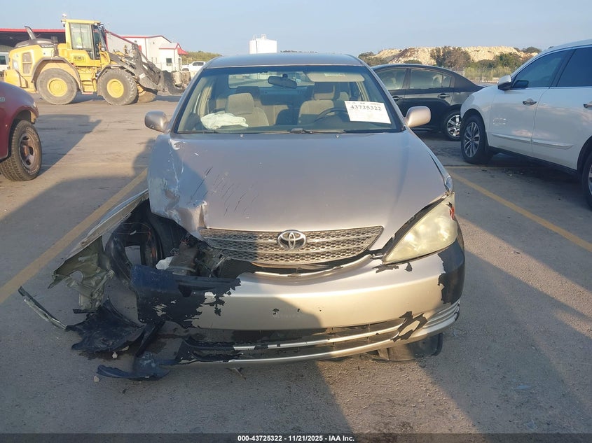 2003 Toyota Camry Le VIN: 4T1BE30K73U787115 Lot: 43725322