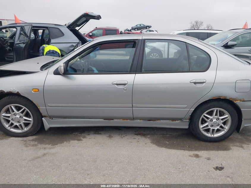 2000 Infiniti G20 Luxury/Touring VIN: JNKCP11A1YT307739 Lot: 43725959