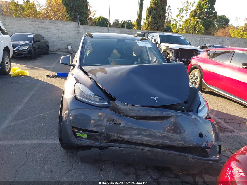 2023 Tesla Model Y Awd/Long Range Dual Motor All-Wheel Drive VIN: 7SAYGDEE1PA061587 Lot: 43726765