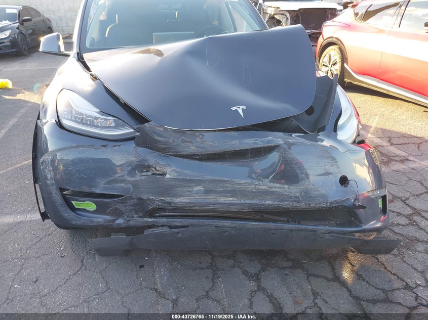 2023 Tesla Model Y Awd/Long Range Dual Motor All-Wheel Drive VIN: 7SAYGDEE1PA061587 Lot: 43726765