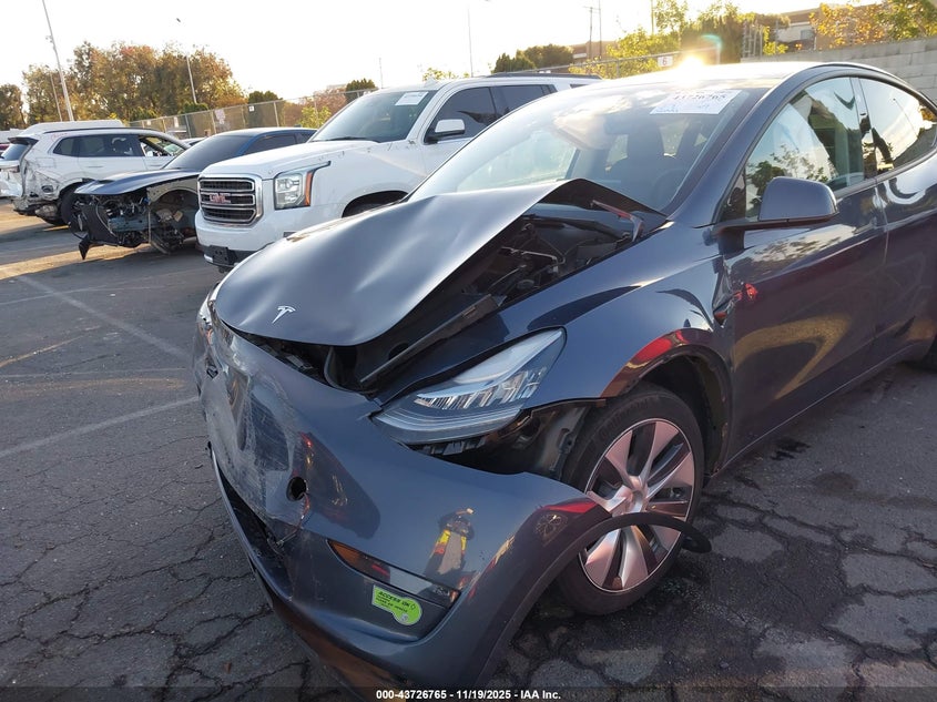 2023 Tesla Model Y Awd/Long Range Dual Motor All-Wheel Drive VIN: 7SAYGDEE1PA061587 Lot: 43726765