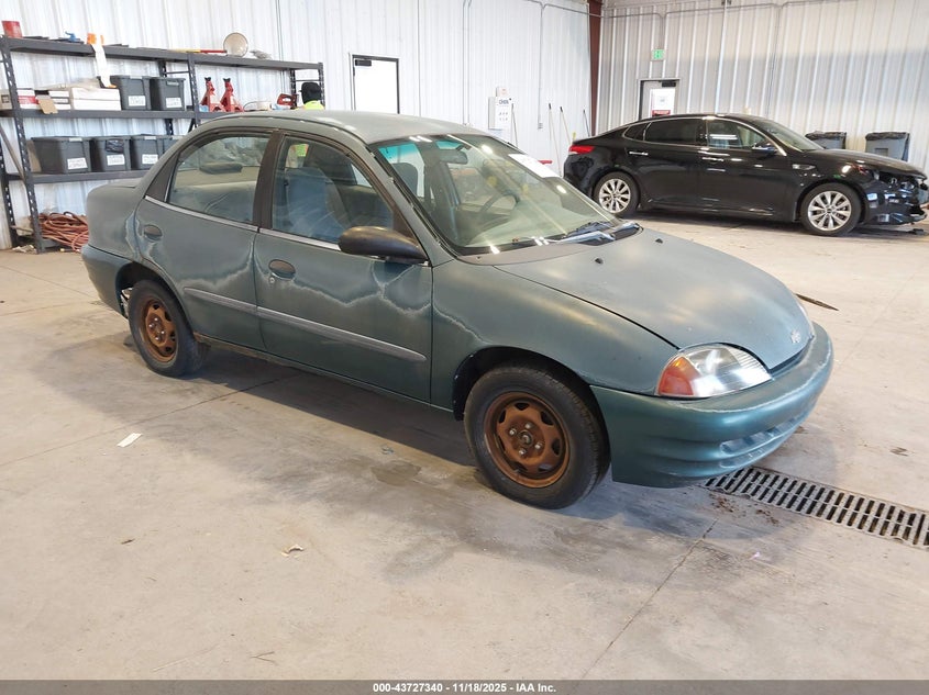 1998 CHEVROLET METRO Green VIN: 2C1MR5225W6734147
