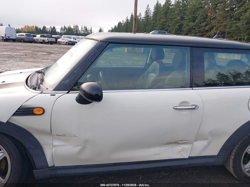 2009 Mini Cooper VIN: WMWMF33599TU73882 Lot: 43727876