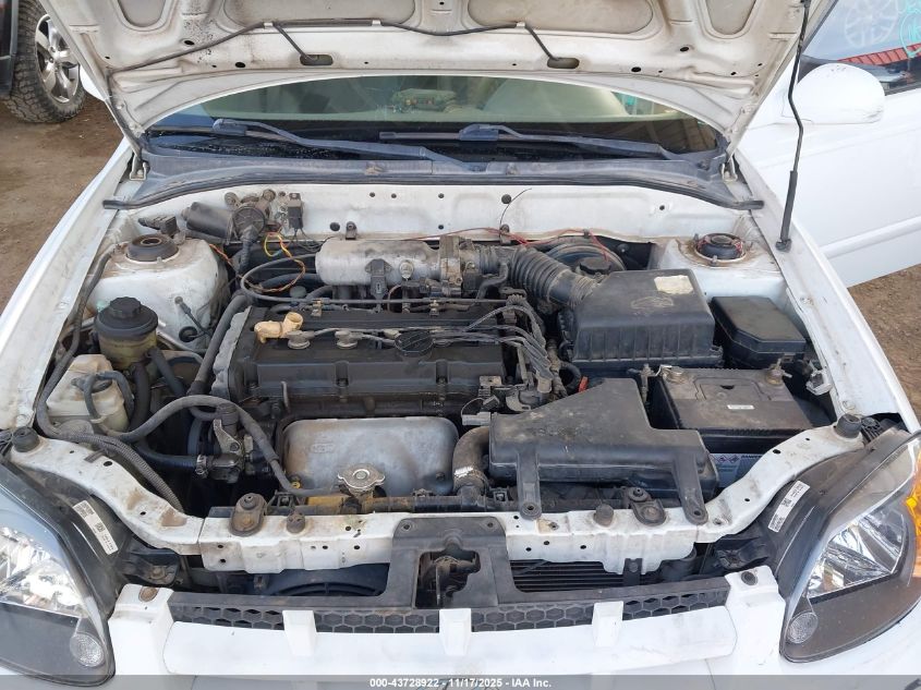 2004 Hyundai Accent Gl VIN: KMHCG45C74U500640 Lot: 43728922